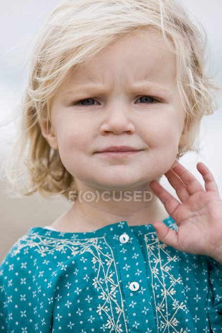 Portrait of blonde little girl outdoors — Stock Photo