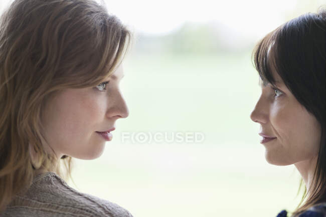 Woman and her mother face to face — Stock Photo