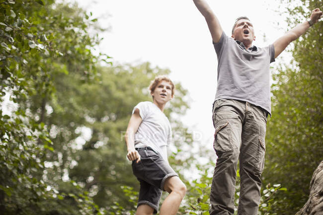 Father and son enjoying in a park — Stock Photo