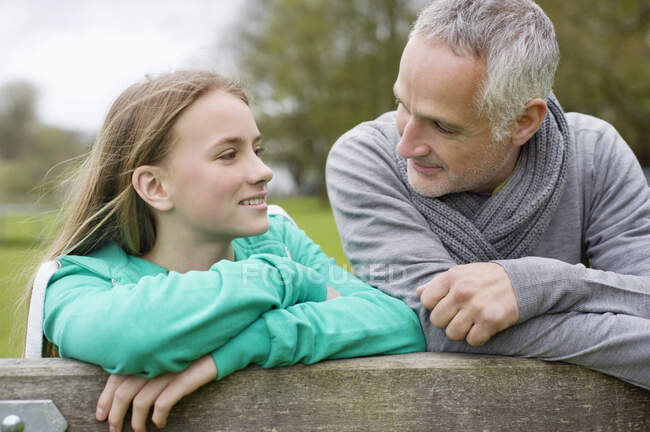Man with his daughter in a farm — Stock Photo
