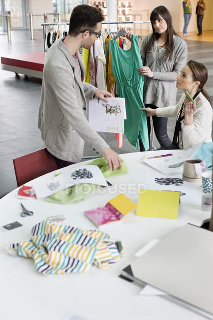 Fashion designers working in office together — Stock Photo
