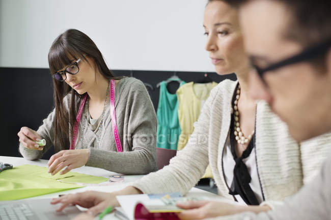 Fashion designers working in office together — Stock Photo