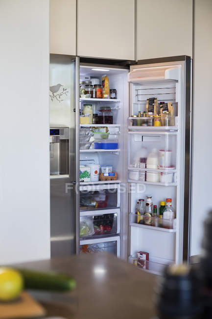 Assorted food in refrigerator, selective focus — Stock Photo