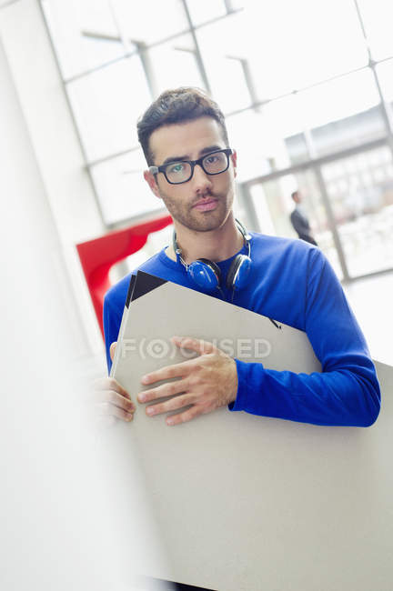 Design professional carrying drawing board — Stock Photo