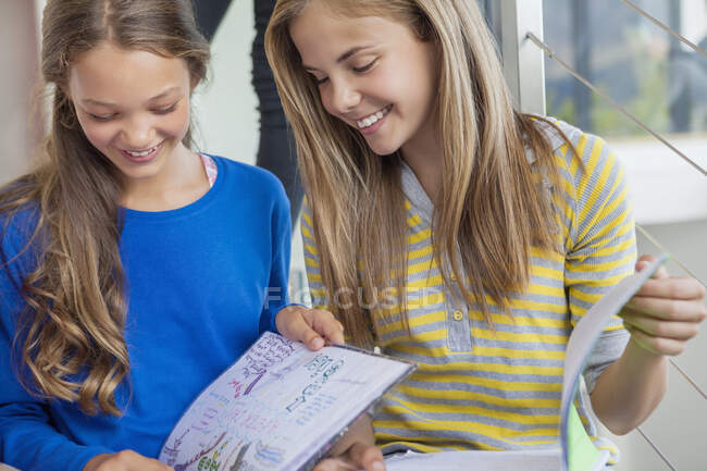 Two girls studying in a school — Stock Photo