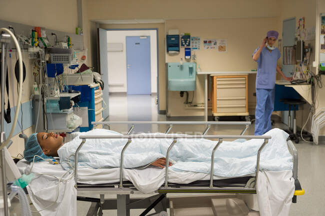 Doctor And Nurse Attending A Patient In Recovery Room Stock Photo Adobe  Stock, Attend Patient