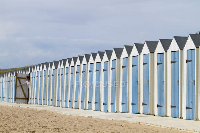 France, Western France, Saint-Gilles-Croix-de-Vie, lined-up bathing huts. One hut is open. — Stock Photo