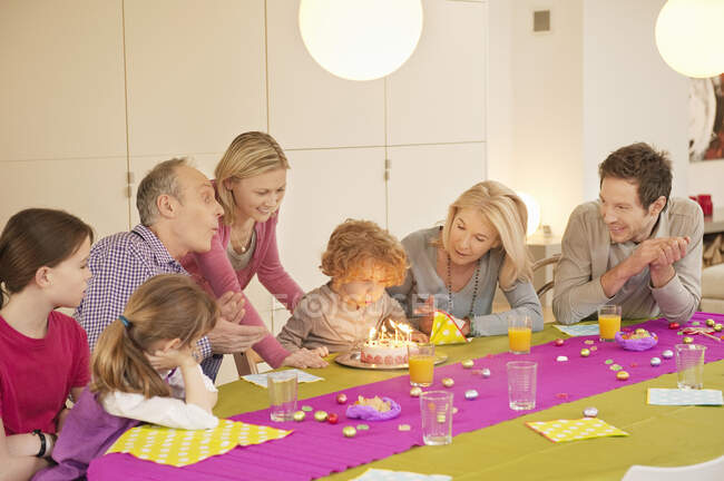 Family at a birthday celebration — Stock Photo