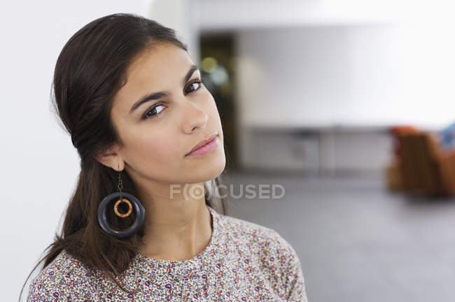 Portrait of elegant young woman with dark hair — Stock Photo