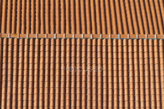 France, Western France, Yeu island, Closeup of a tiled roof, building at the foot of the Great Lighthouse. — Stock Photo