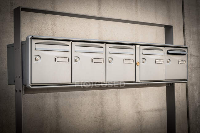 Outside letterboxes in a small building — Stock Photo