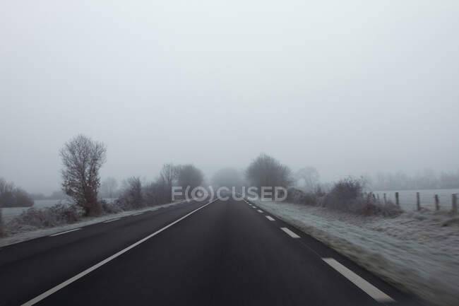 France, road in the country covered with frost. — Stock Photo