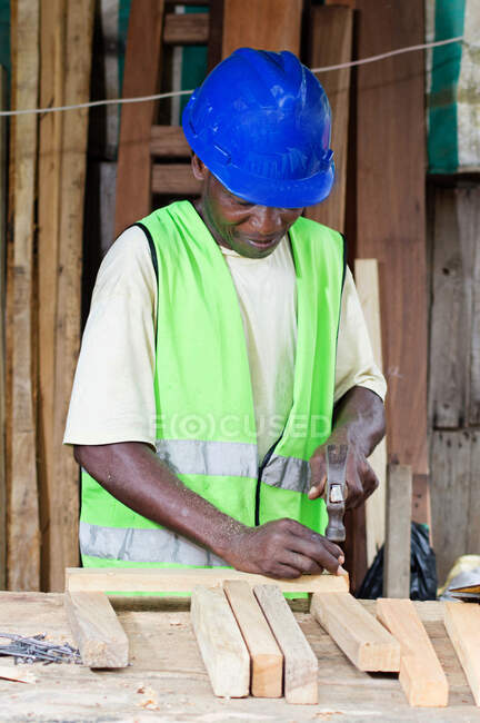 The carpenter made the first elements of a table. — Stock Photo