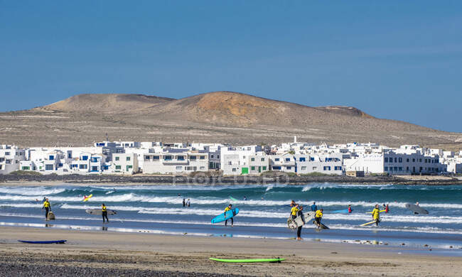 Spain, Canary Islands, Lanzarote Island, beach and village of Caleta de Famara — Stock Photo