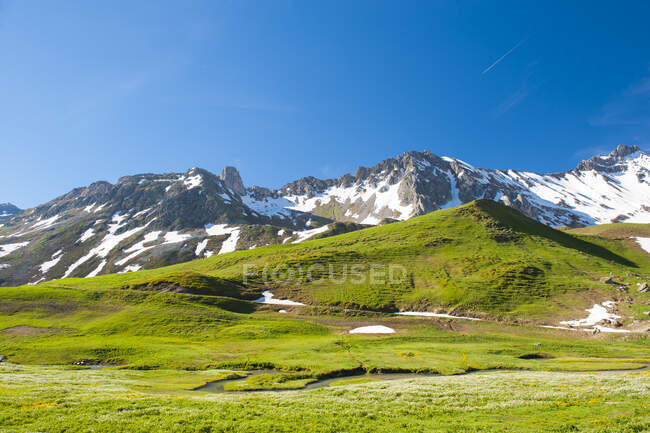 France, Savoie, mountain pastures and glaciers at the col des saisies — Stock Photo
