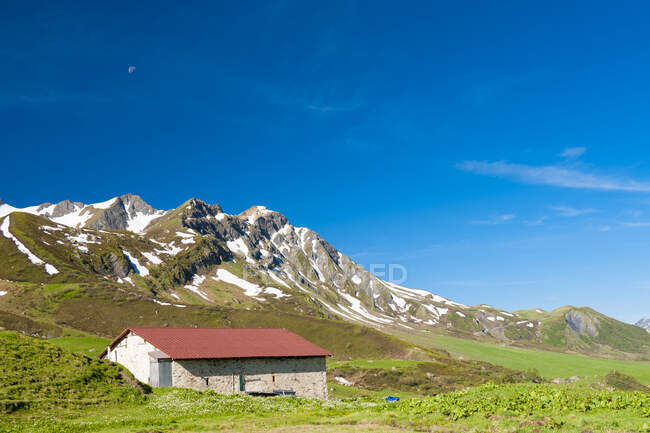 France, Savoie, a refuge in the mountain pastures and glaciers at the col des saisies — Stock Photo