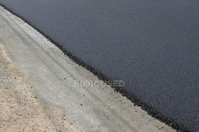 Primo piano di asfalto pavimentazione. — Foto stock
