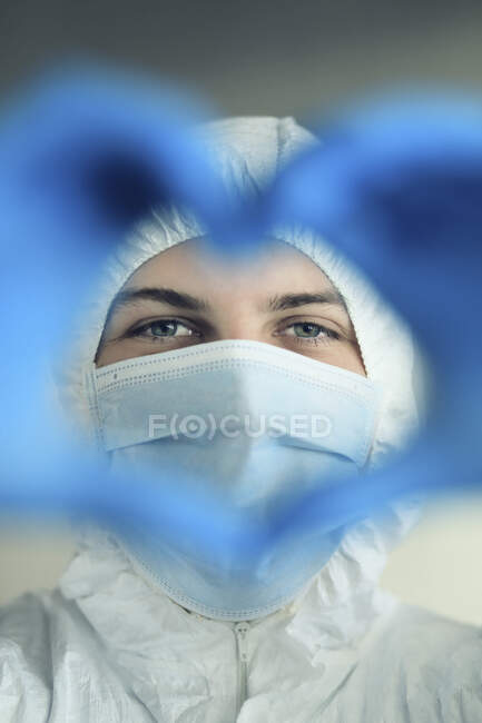 Female doctor in protection against coronavirus — Stock Photo