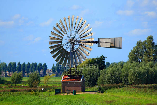 Netherlands, wind machine over blue sky — Stock Photo