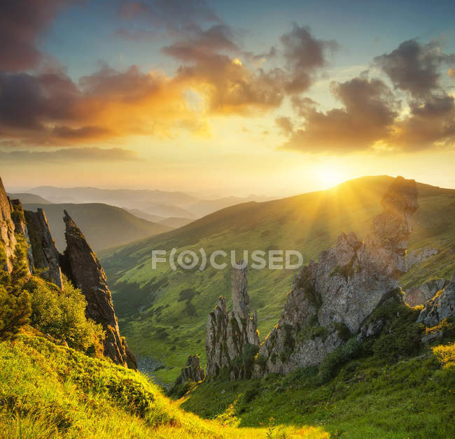 Mountain valley during sunrise — Stock Photo