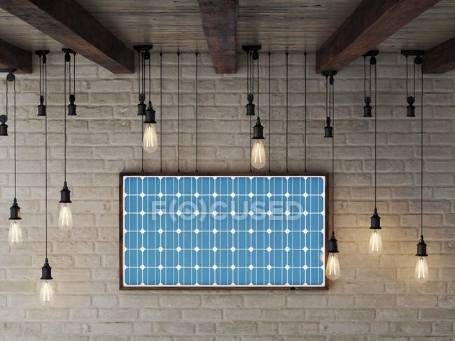 Solar energy frame on brick wall makes electric energy — Stock Photo