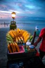 Close-up view of various delicious snacks on beach at Bali — Stock Photo