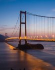 Zhejiang Hou puente de cruzar el mar en la provincia de Shanxi durante la puesta del sol - foto de stock