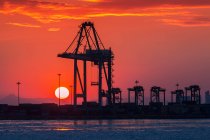 Industrial port at sunset, Qinhuangdao, Hebei, China — Stock Photo