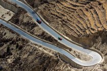 Vista aerea di tortuoso autostrada Sichuan-Tibet in montagna — Foto stock