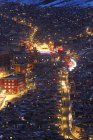 Aerial view of Wuming Buddhist College at night of Seda County, Sichuan province, China — Stock Photo