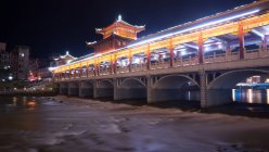 Illuminated bridge at night, Taian, Shandong, China — Stock Photo