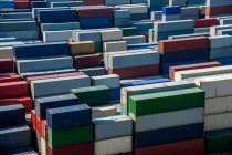 Lot of various cargo containers in harbor at China — Stock Photo