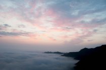 Aerial view of scenic mountains in clouds at sunrise, Henan Province, Xinxiang — Stock Photo