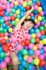 Cute little girl playing in the playground — Stock Photo