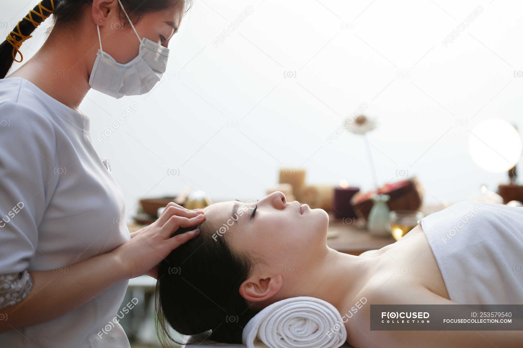 Young Asian Woman Receiving Head Massage At Spa Salon — Health