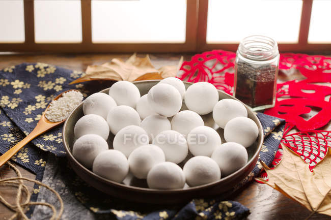 Delicious traditional chinese glutinous rice balls on table — Stock Photo