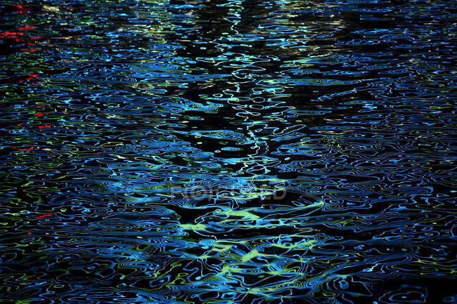Full frame view of beautiful dark blue water ripples — Stock Photo