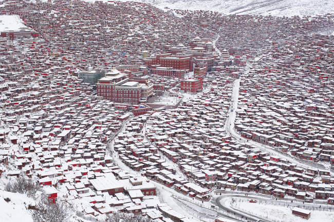 Aerial view of Wuming Buddhist College at snow of Seda County, Sichuan province, China — Stock Photo