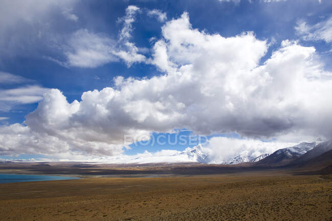 Rainbow in storm clouds over Cottonwood Mountains in Death Valley National Park. — Stock Photo