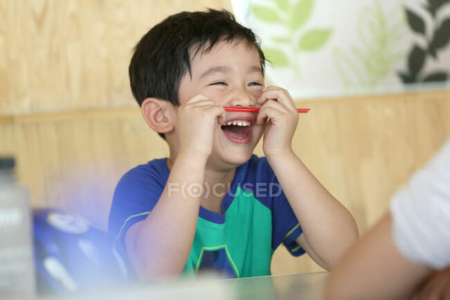 Portrait of boy laughing — Stock Photo
