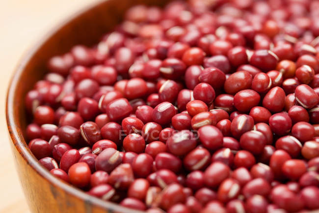 Close-up view of raw red Adzuki beans in bowl — Stock Photo