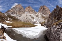 The Langkofel seen from the four-and-a-half-hour, moderately difficult hike around its main summit in the Gardena / Grden Dolomites, Trentino-Alto Adige, Italy, Europe — стоковое фото