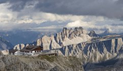 The dolomites in the Veneto. Rifugio Lagazuoi in the foreground, Croda da Lago mountain range in the background. The Dolomites are listed as UNESCO World heritage. europe, central europe, italy — Stock Photo