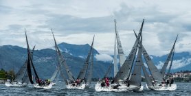 Sailboats racing on Lake Como, Mandello del Lario, Lombardy, Italy, Europe — Stock Photo