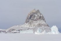 Uummannaq during winter in northern Greenland, seen from the frozen fjord. America, North America, Denmark, Greenland — Stock Photo
