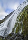 Cascada Dynjandi, un icono de los fiordos del oeste. The remote Westfjords (Vestfirdir) in north west Iceland (en inglés). Europa, Escandinavia, Islandia - foto de stock