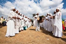 Groups of dancers and musicans are celebrating timkatTimkat cerimony of the ethiopian orthodox church, Timkat procession is entering the jan meda sports ground in Addis Ababa, where the three day cerimony takes place, Timkat  is also the celebration — Stock Photo