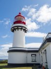 Ponta do Topo with lighthouse, at the eastern part of the island.  Sao Jorge Island, an island in the Azores (Ilhas dos Acores) in the Atlantic ocean. The Azores are an autonomous region of Portugal. Europe, Portugal, Azores — Stock Photo