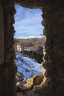 Santa Maria della Piet church and Corno Grande in Winter, Gran Sasso e Monti della Laga National Park, Abruzzo, Italy — стоковое фото