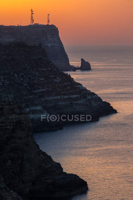 Sunset at Capo Ponente cape, Lampedusa Island, Pelagie Islands, Sicilia, Italia, Europa. - foto de stock